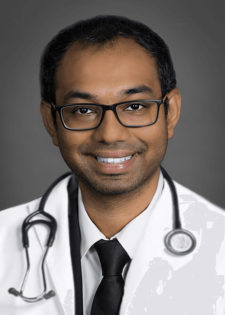 Dr. Anish Y. Desai, Medical Director at Be You Esthetic Suites — portrait in white coat.